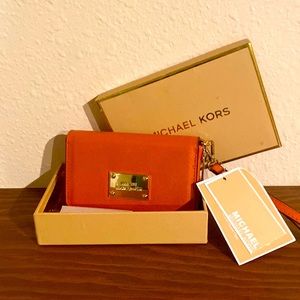 Michael Kors-Multifuncional Phone Case. Burnt Orange. Brand New/Never Used.